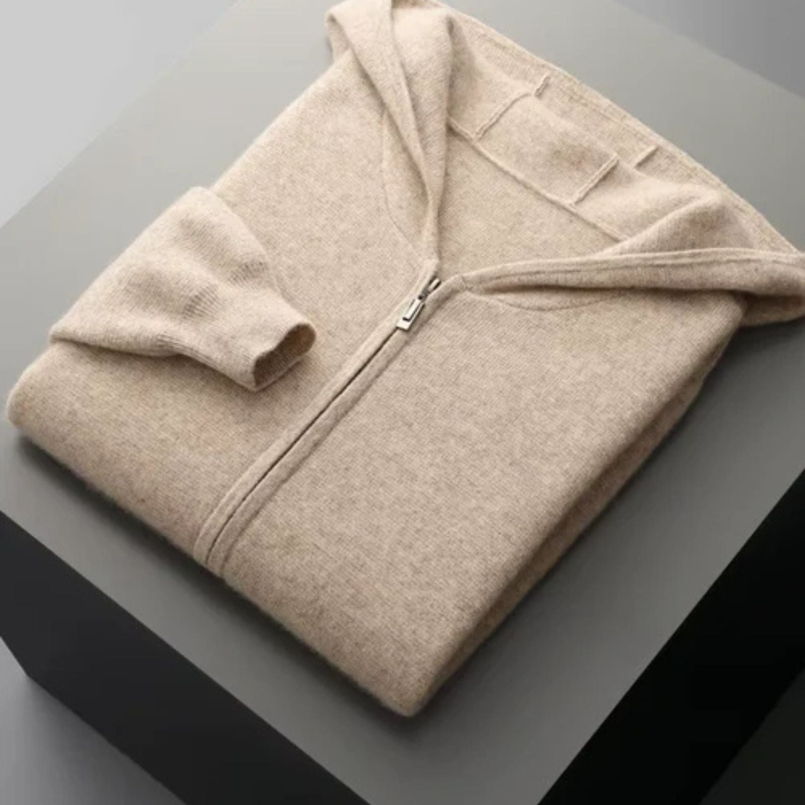 Le sweat à capuche zippé en laine mérinos Lucerne