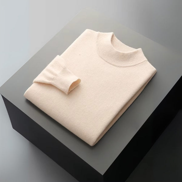 Le pull à col montant en laine mérinos Genève